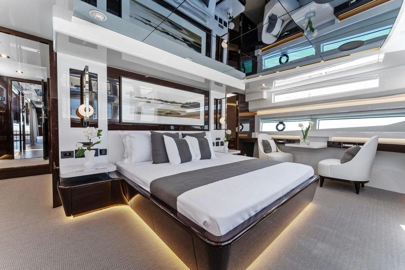 a room with a bed and a couch aboard KNEAD IT Yacht for Sale