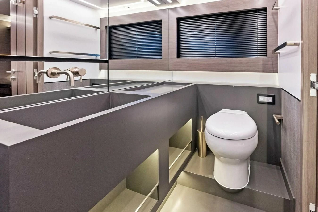 a bathroom with a tub and toilet aboard KNEAD IT Yacht for Sale