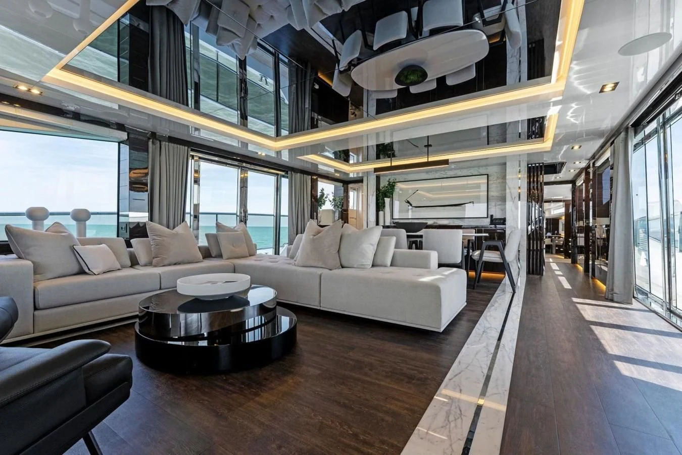 a living room with a large window aboard KNEAD IT Yacht for Sale