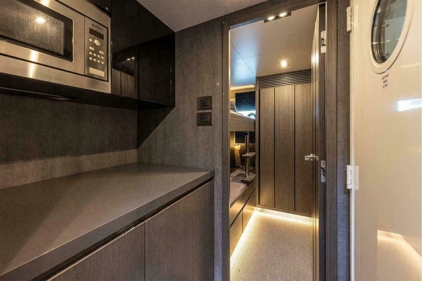 a hallway with a few doors aboard KNEAD IT Yacht for Sale