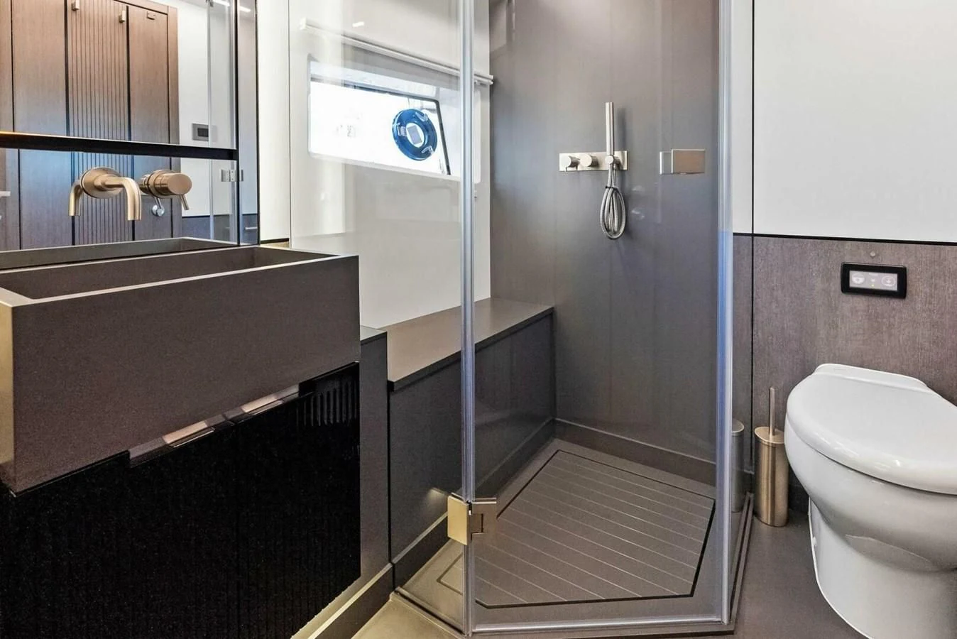 a bathroom with a stand up shower aboard KNEAD IT Yacht for Sale