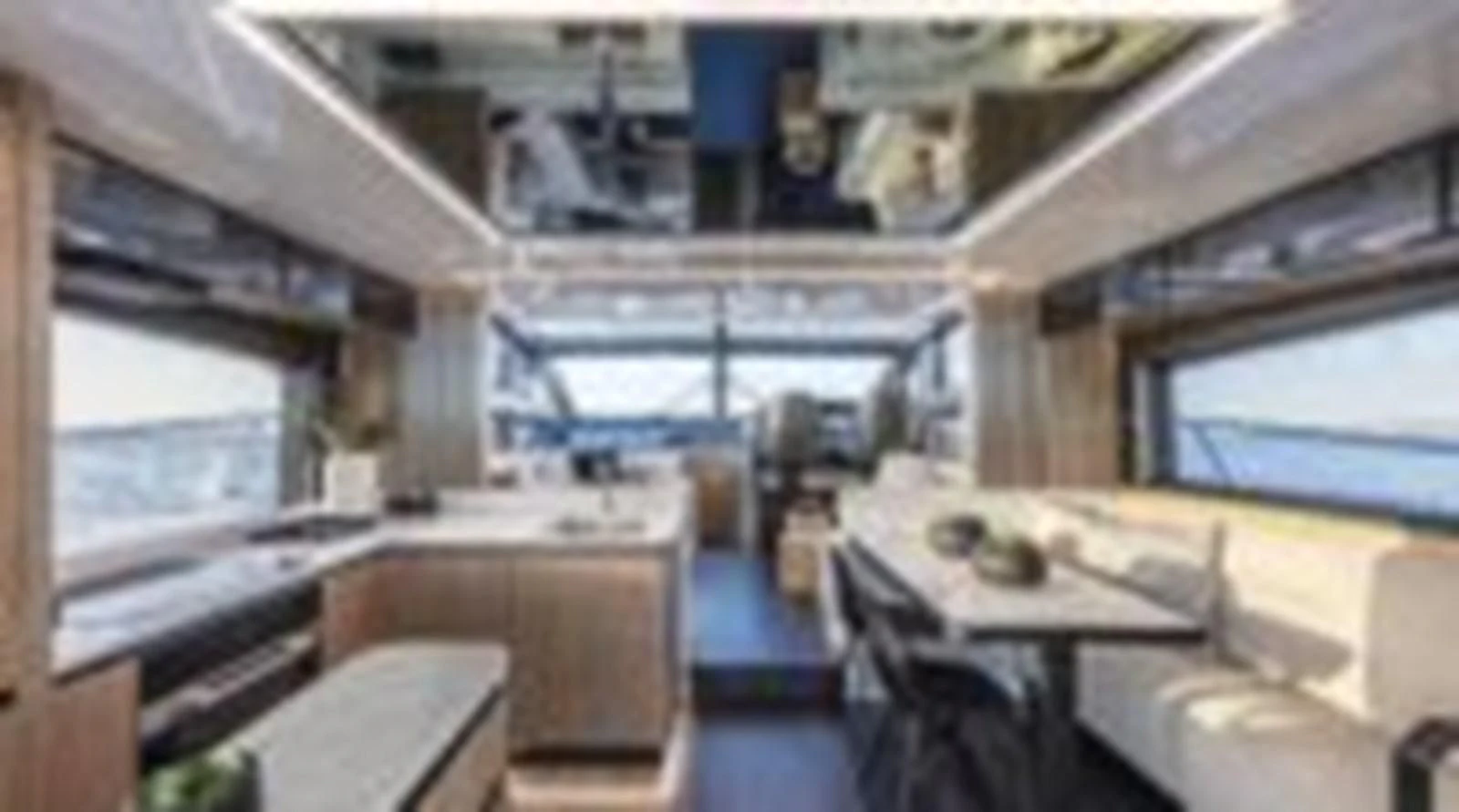 a room with tables and chairs aboard KNEAD IT Yacht for Sale