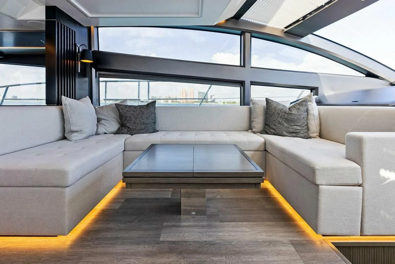 a living room with a large glass window aboard KNEAD IT Yacht for Sale