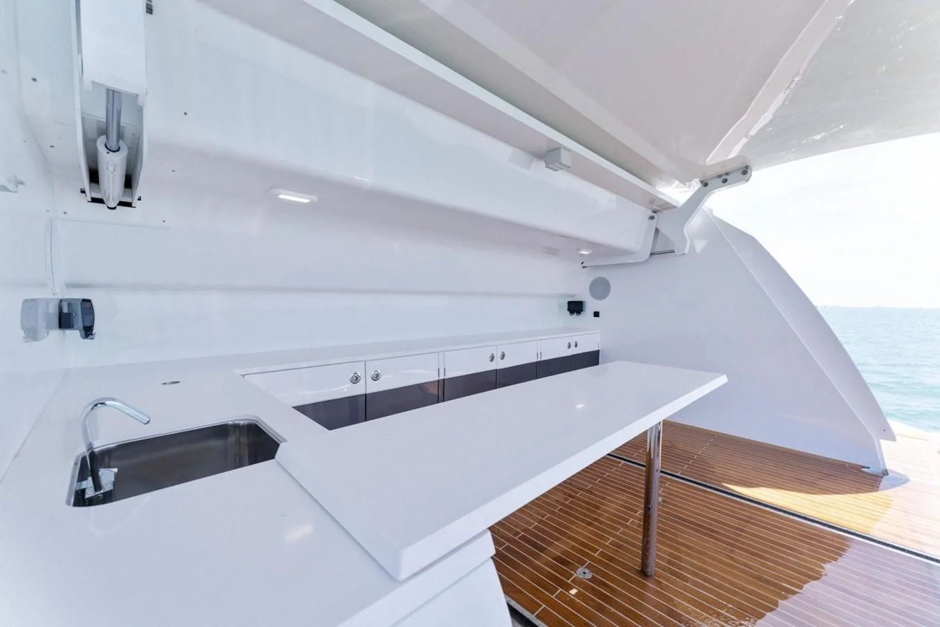 a white boat with a sink aboard KNEAD IT Yacht for Sale