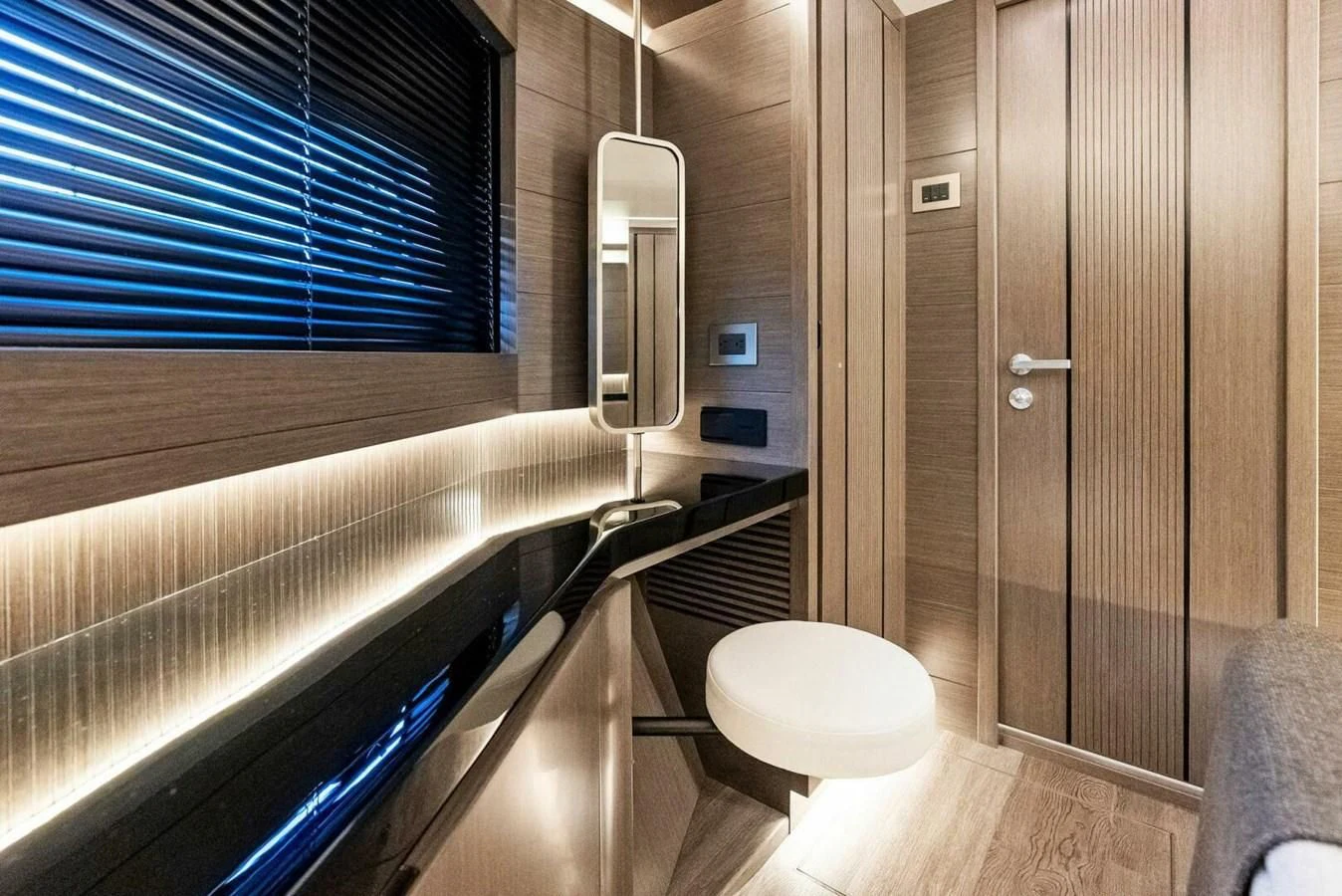a bathroom with a glass door aboard KNEAD IT Yacht for Sale