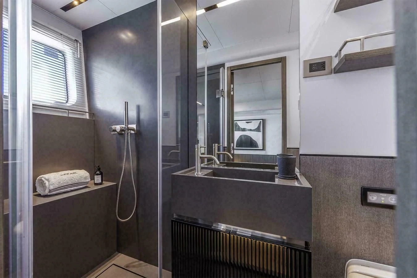 a bathroom with a shower unit aboard KNEAD IT Yacht for Sale
