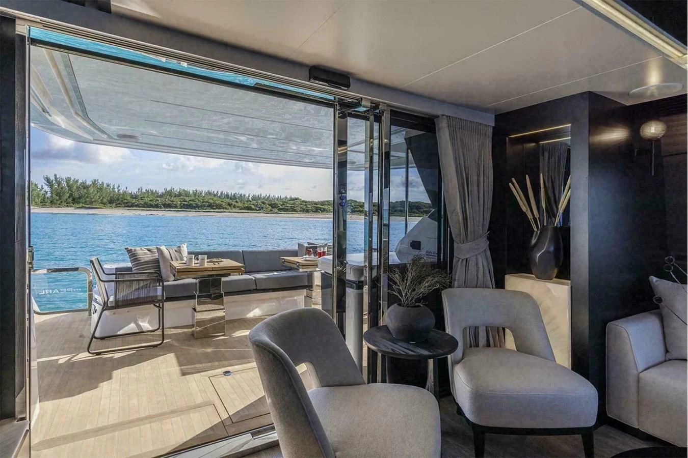 a room with a table chairs and a large window aboard KNEAD IT Yacht for Sale