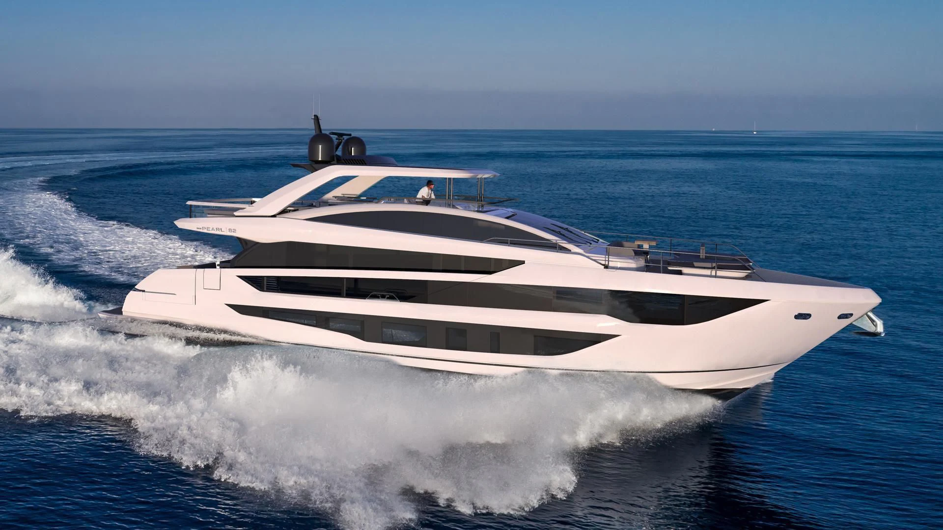 a white yacht on the water aboard KNEAD IT Yacht for Sale