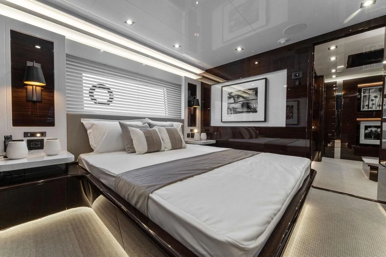 a large bedroom with a large bed aboard KNEAD IT Yacht for Sale