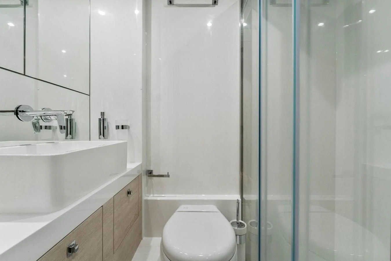 a bathroom with a sink and a toilet aboard KNEAD IT Yacht for Sale