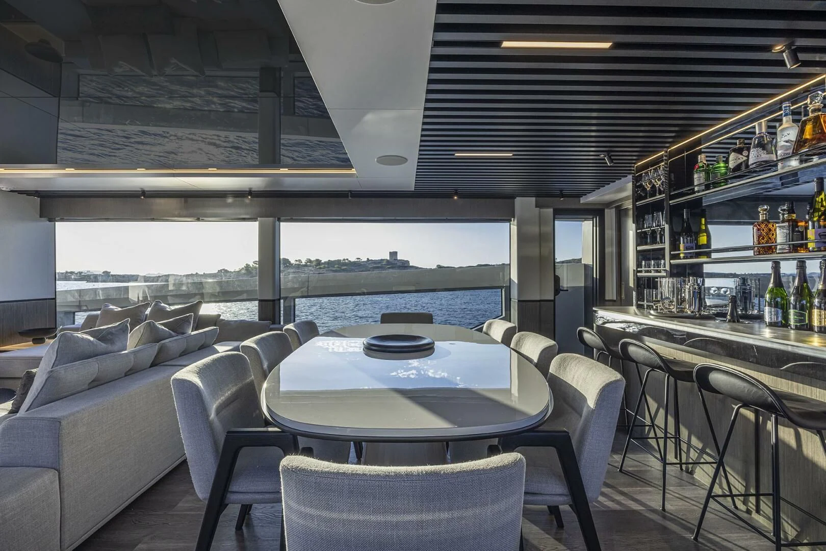 a room with a table and chairs aboard KNEAD IT Yacht for Sale