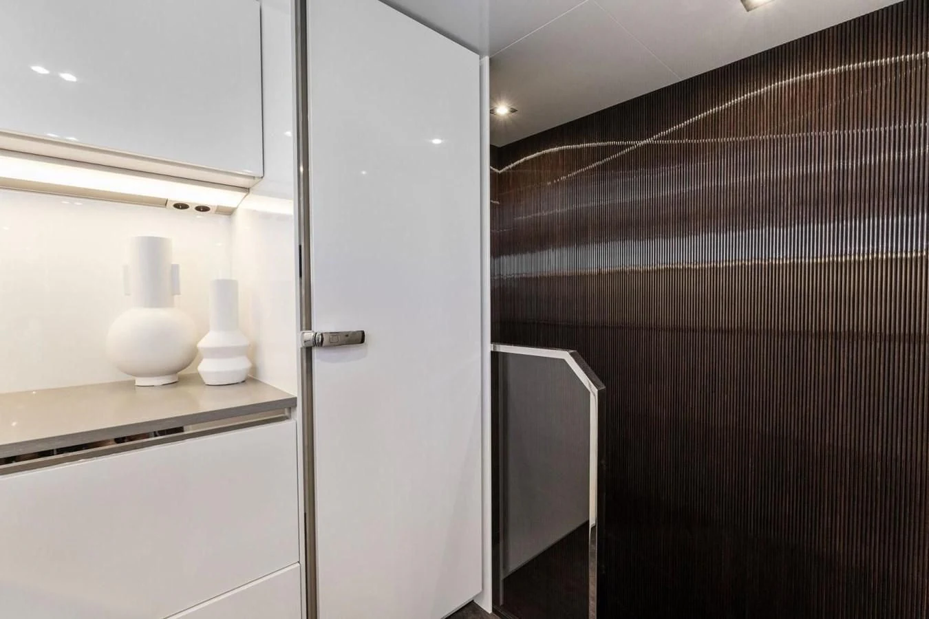 a bathroom with a white toilet aboard KNEAD IT Yacht for Sale