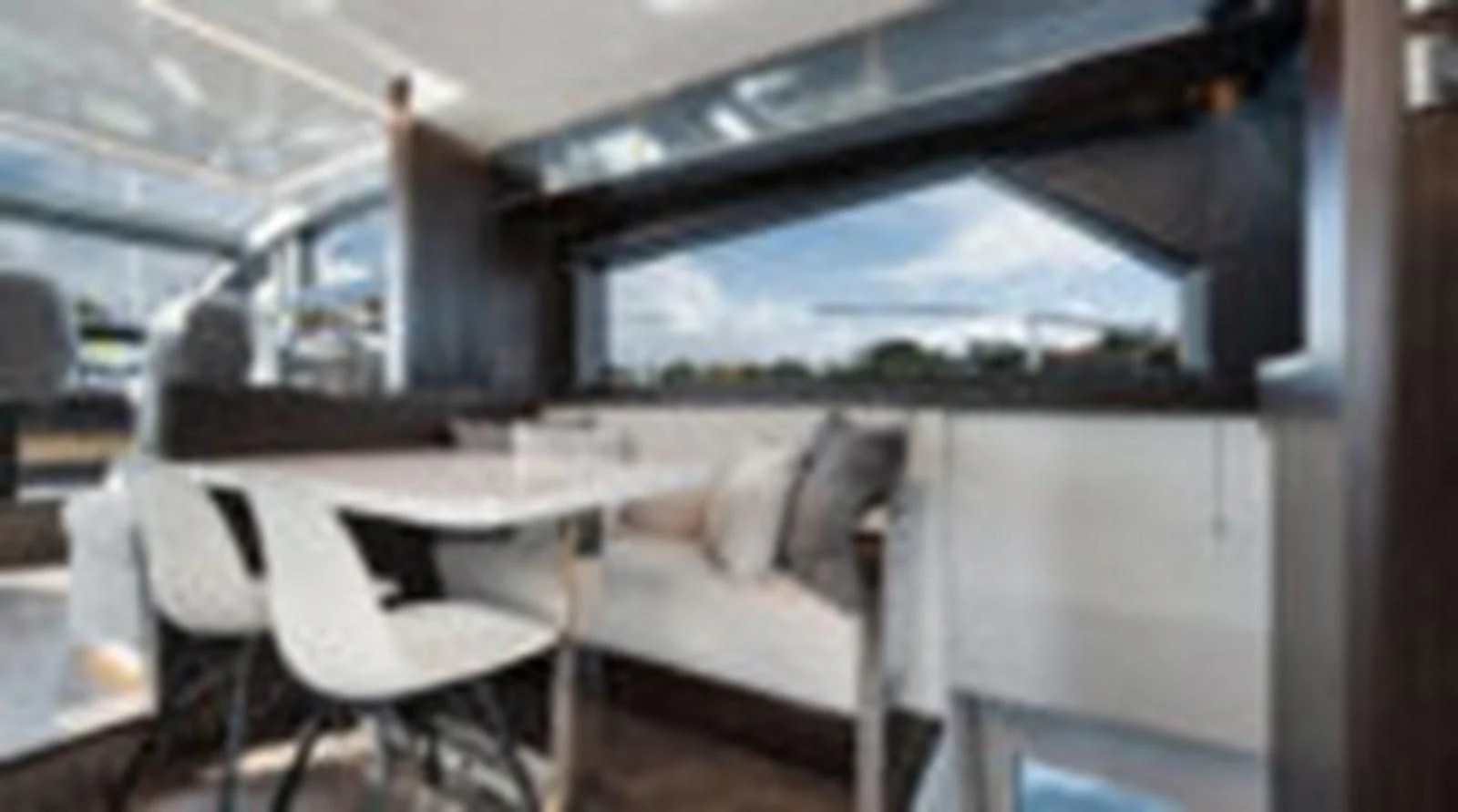 a room with a table and chairs aboard KNEAD IT Yacht for Sale