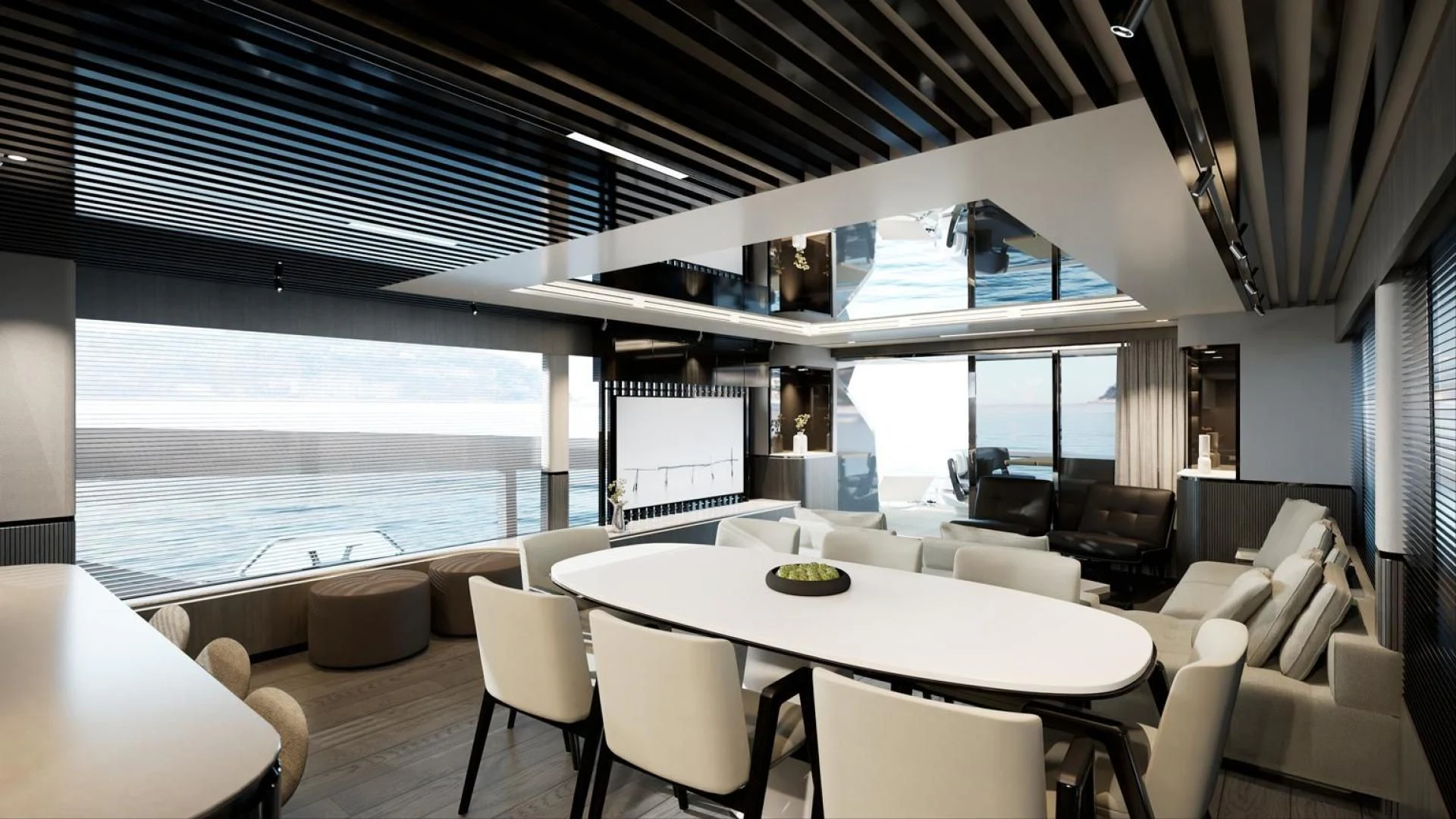 a room with a large window and a table with chairs and a large body of water aboard KNEAD IT Yacht for Sale