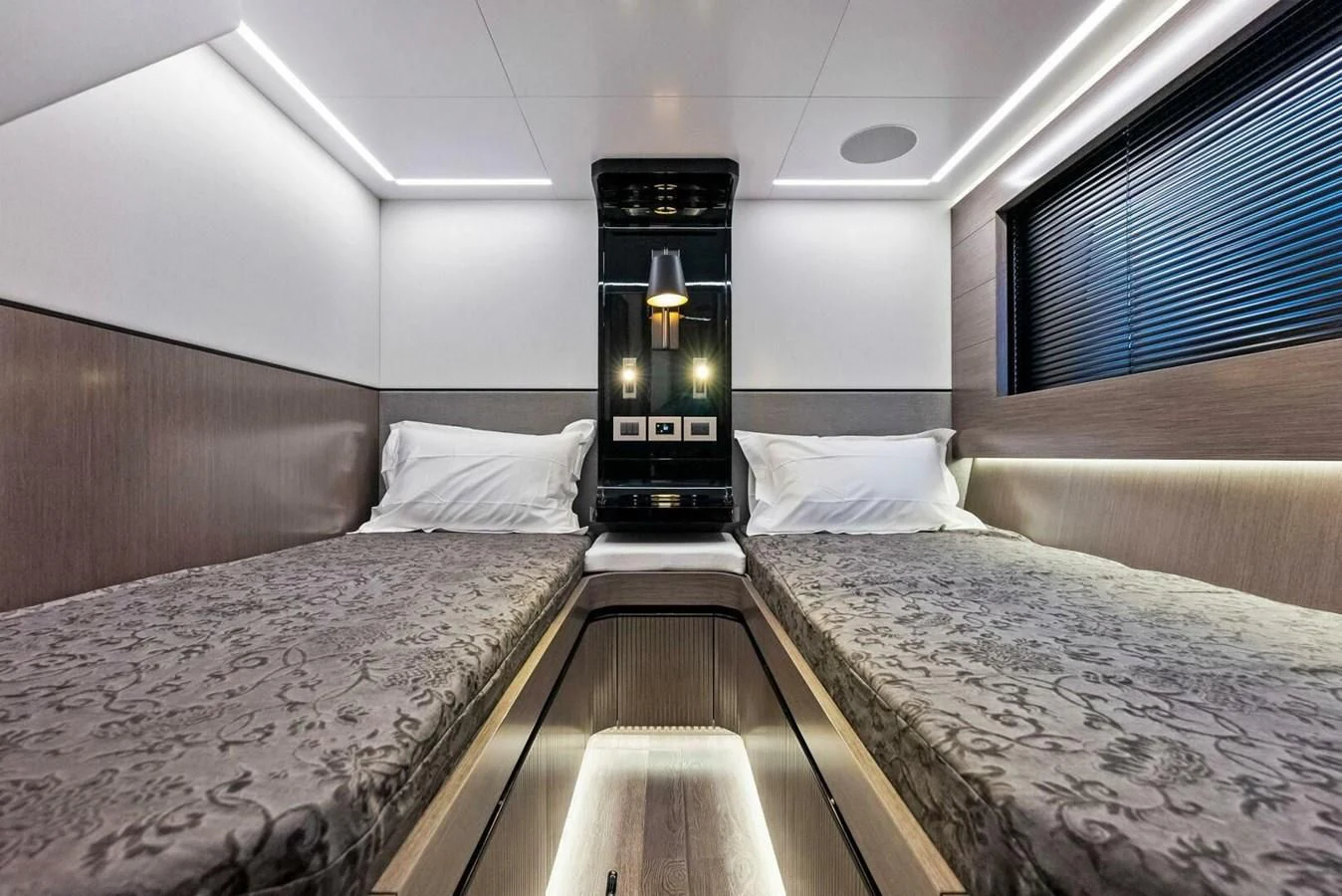 a room with two beds aboard KNEAD IT Yacht for Sale