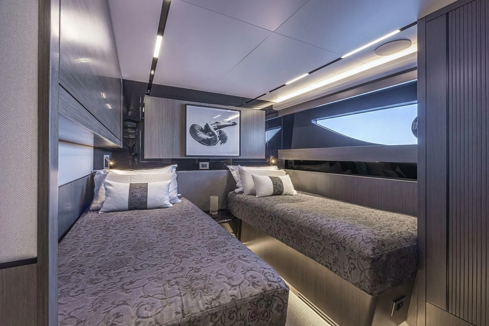 a room with two beds aboard KNEAD IT Yacht for Sale