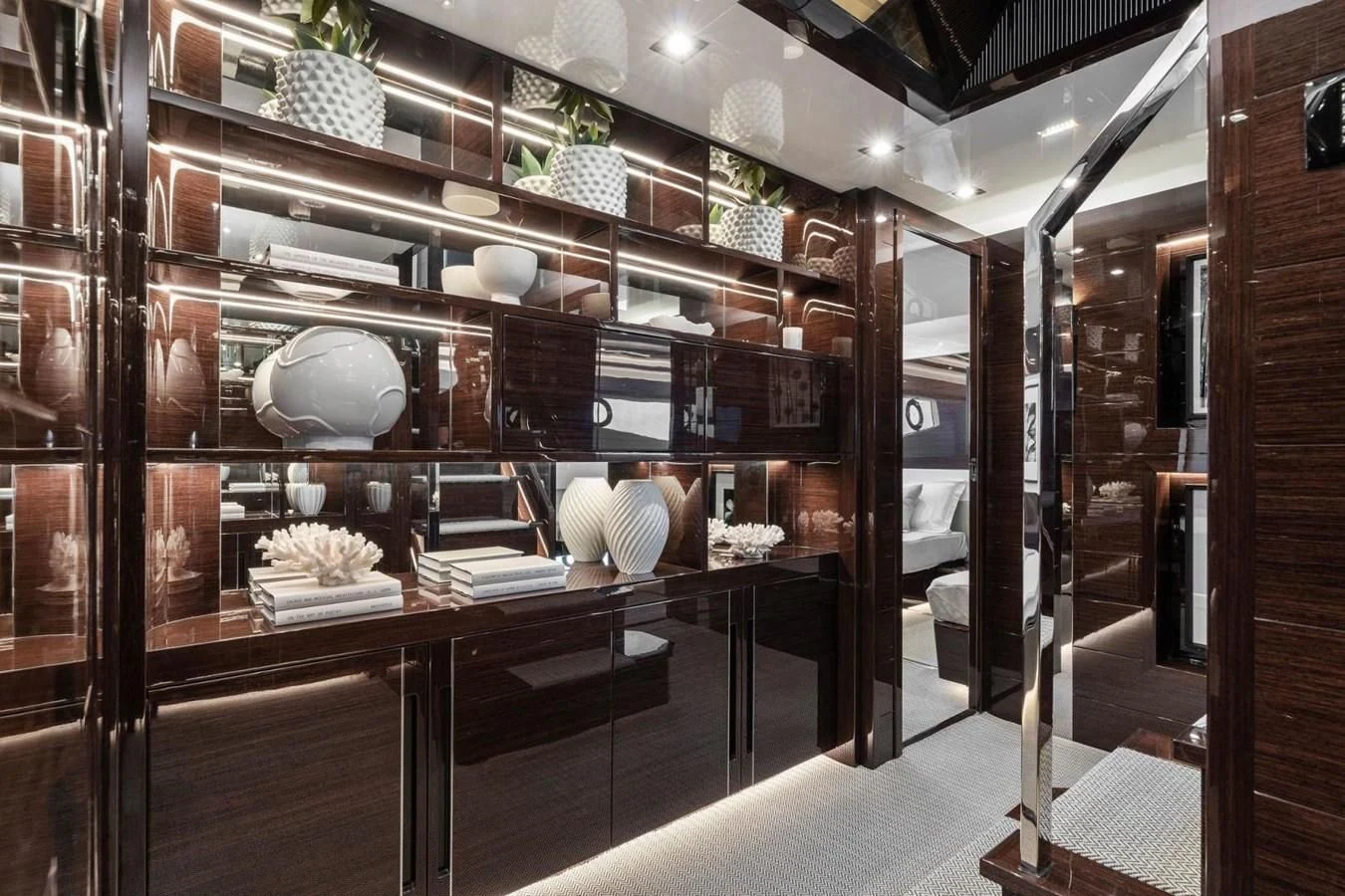 a kitchen with a large glass wall aboard KNEAD IT Yacht for Sale
