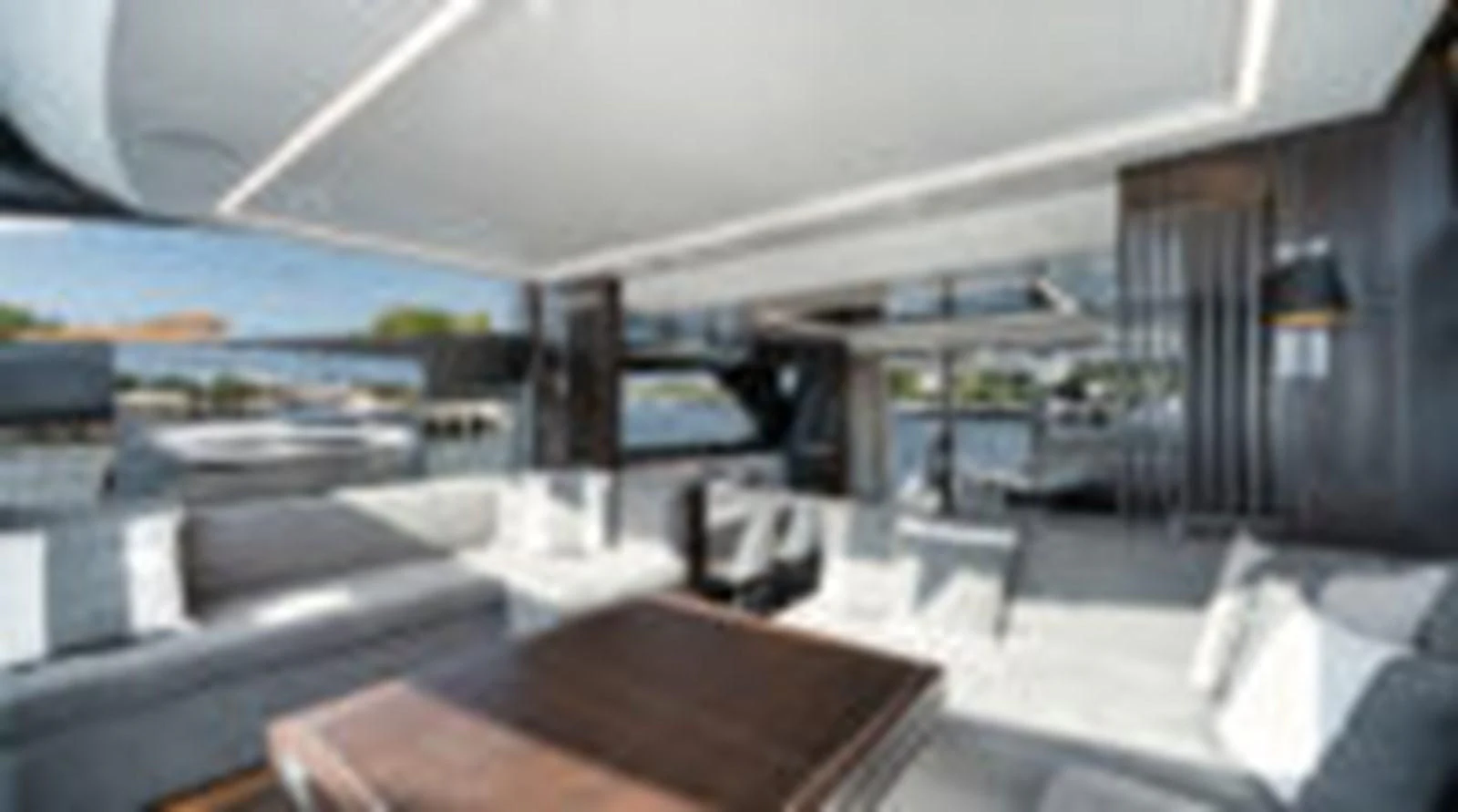 a room with couches and a television aboard KNEAD IT Yacht for Sale