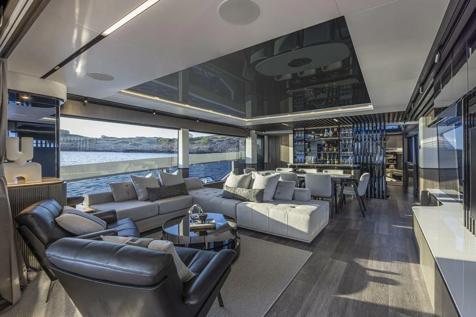 a living room with a large window aboard KNEAD IT Yacht for Sale