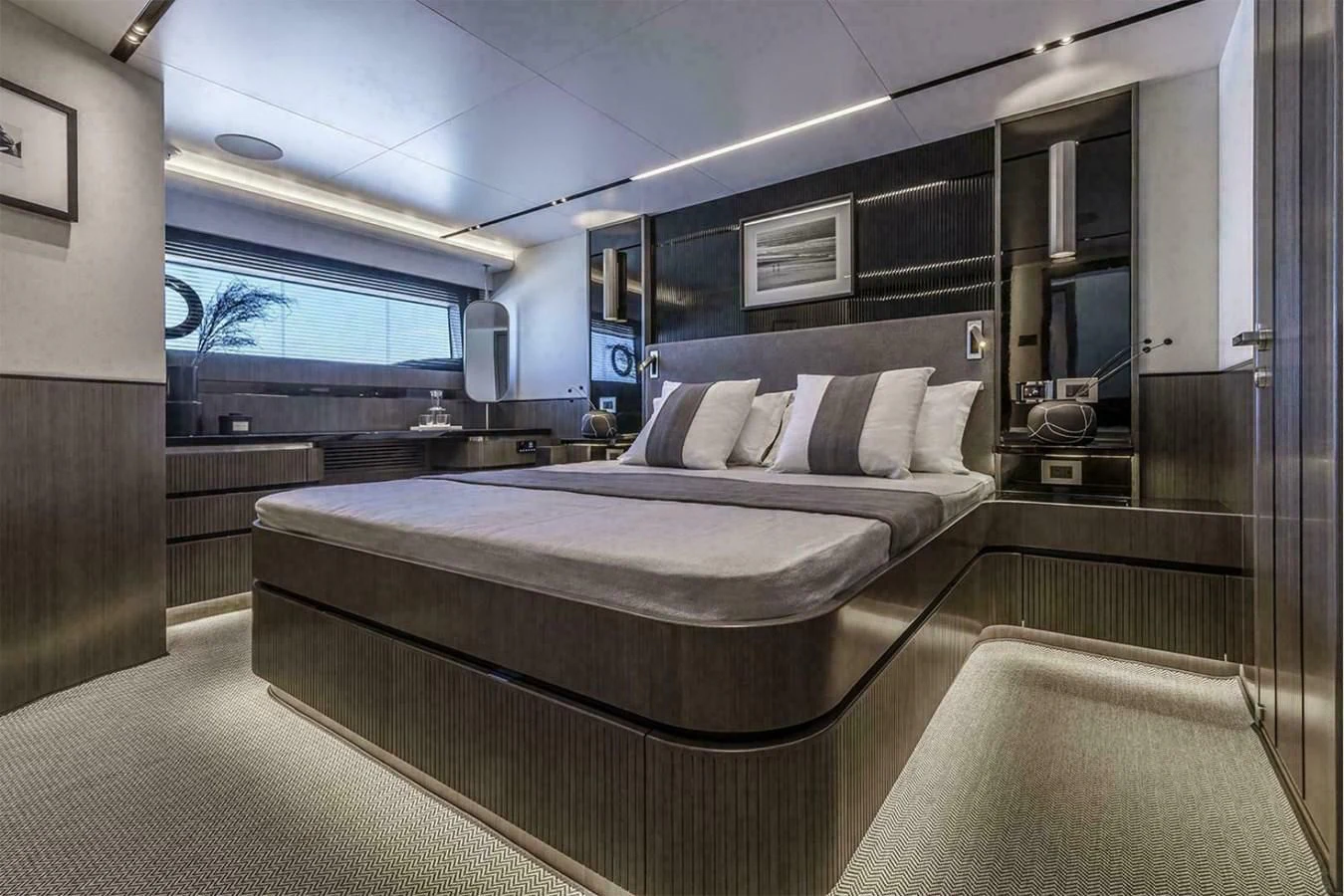 a room with a bed and a window aboard KNEAD IT Yacht for Sale
