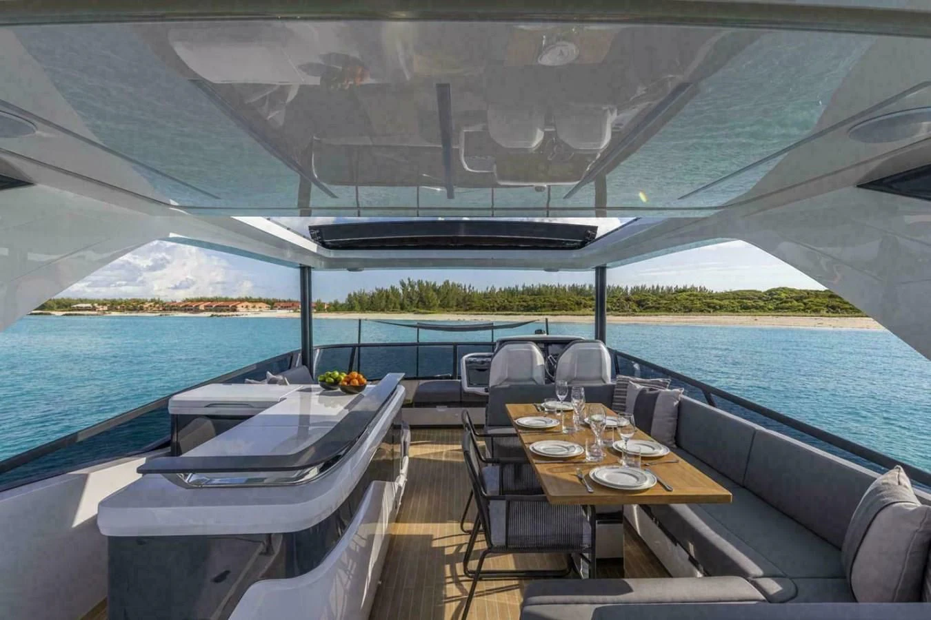 a table and chairs on a boat aboard KNEAD IT Yacht for Sale