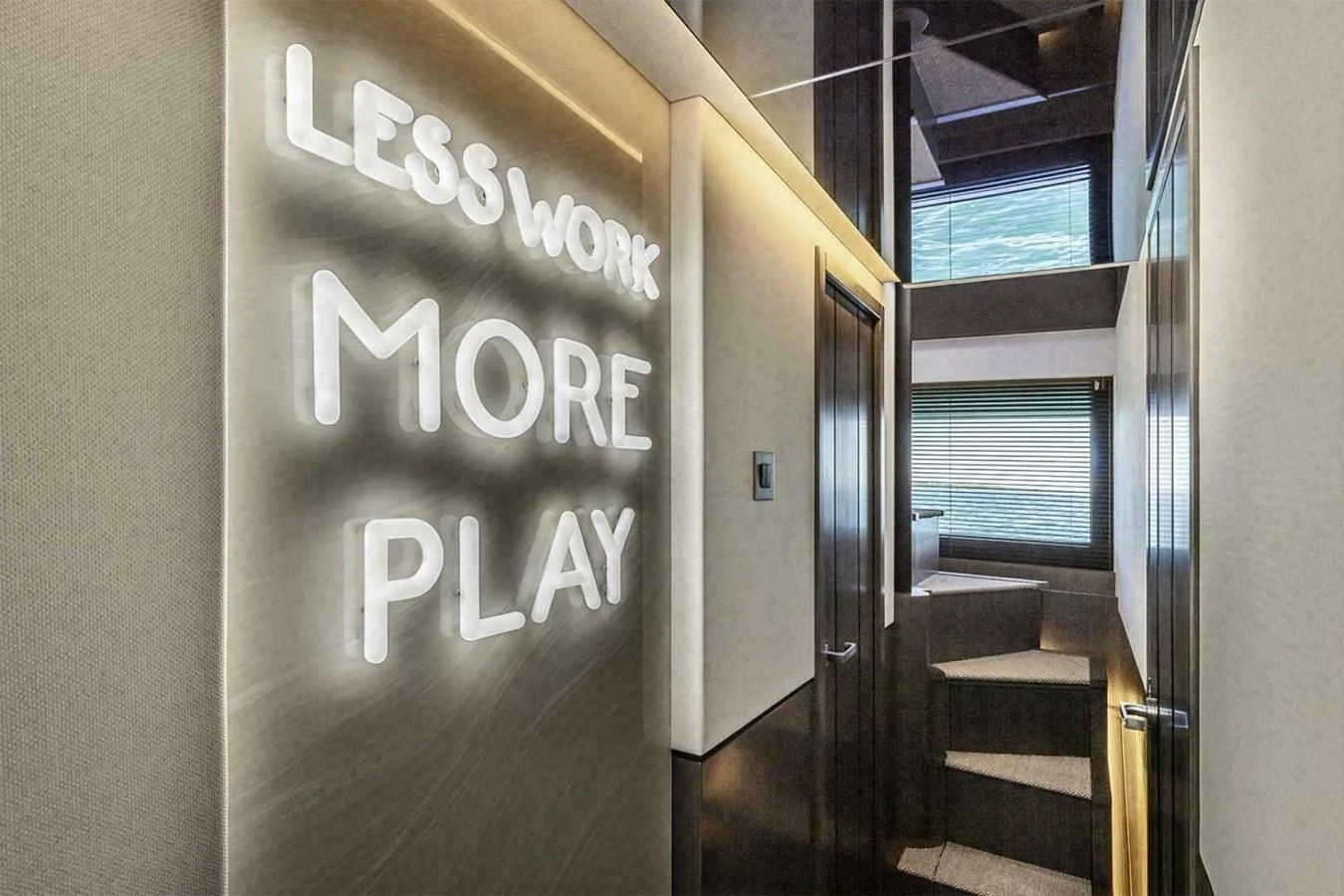 a hallway with a sign on the wall aboard KNEAD IT Yacht for Sale