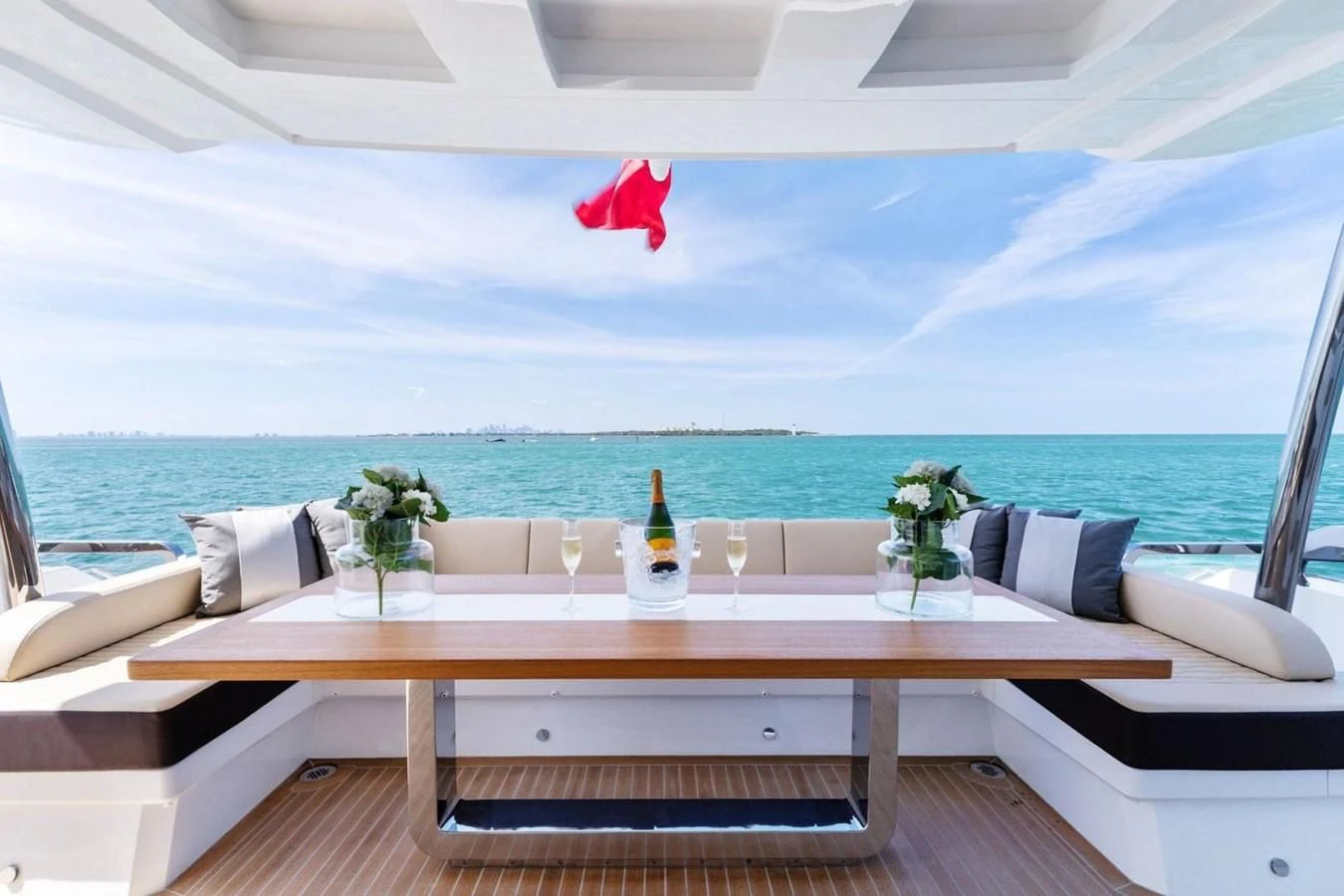 a room with a table and chairs aboard KNEAD IT Yacht for Sale