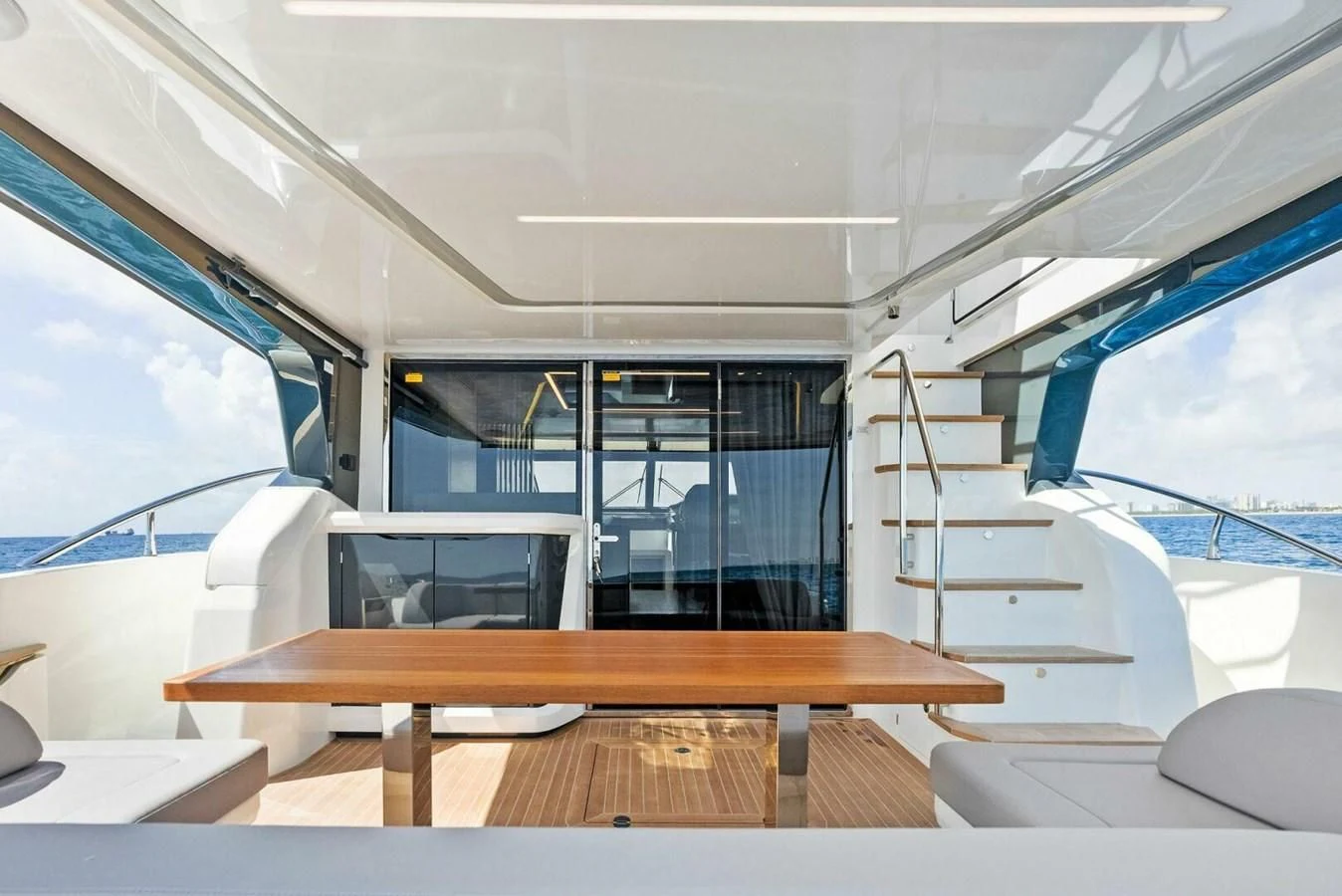 a room with a table and chairs aboard KNEAD IT Yacht for Sale