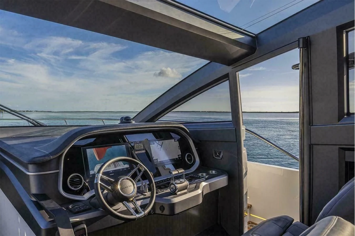 a car with a steering wheel aboard KNEAD IT Yacht for Sale