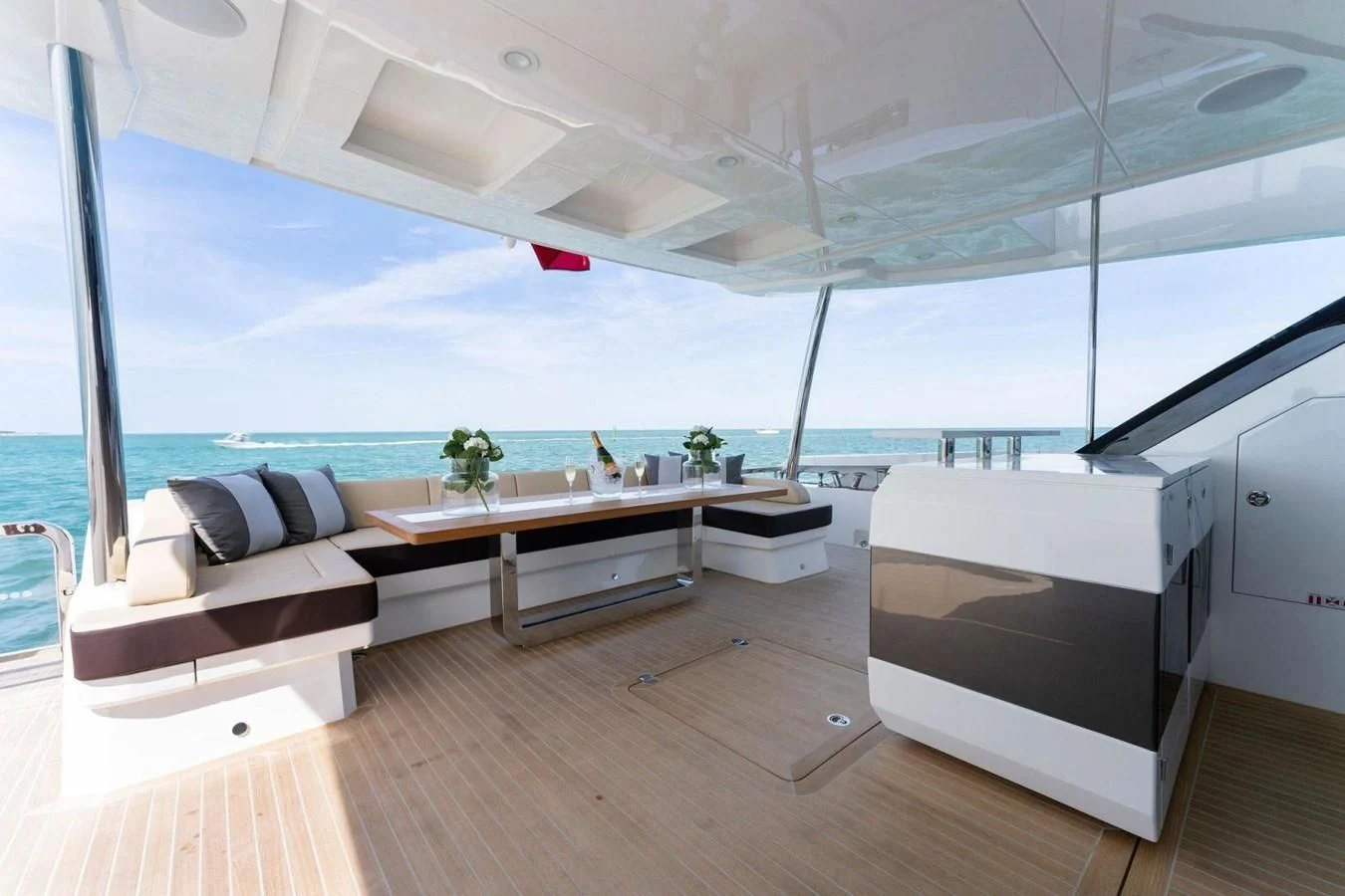 a room with a table and chairs aboard KNEAD IT Yacht for Sale