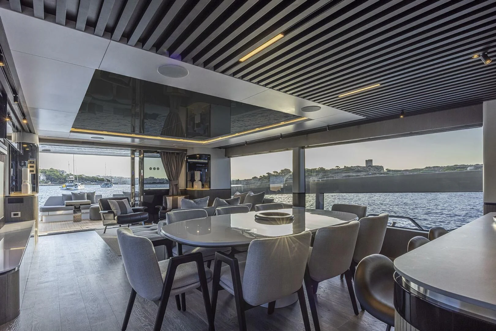 a room with tables and chairs aboard KNEAD IT Yacht for Sale