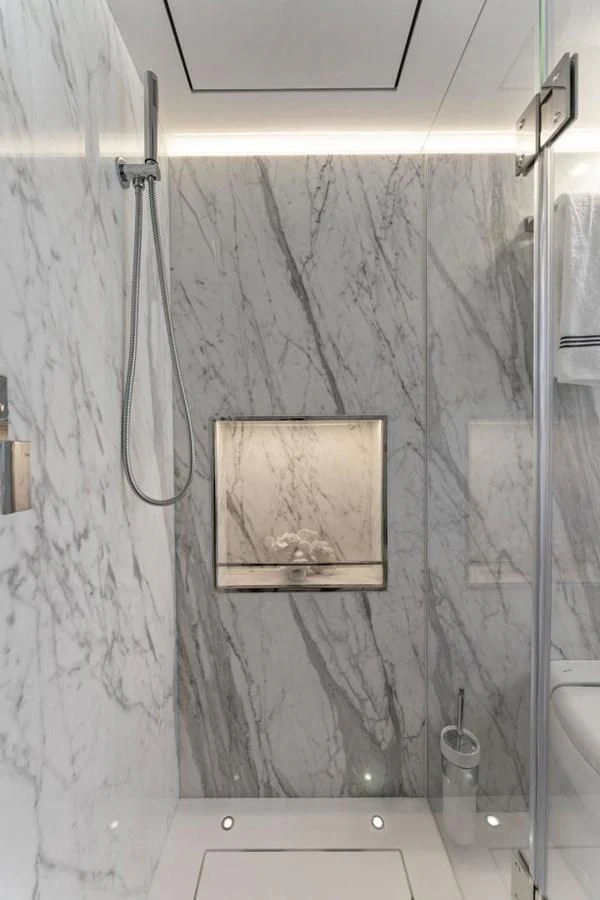 a bathroom with a picture on the wall aboard KNEAD IT Yacht for Sale