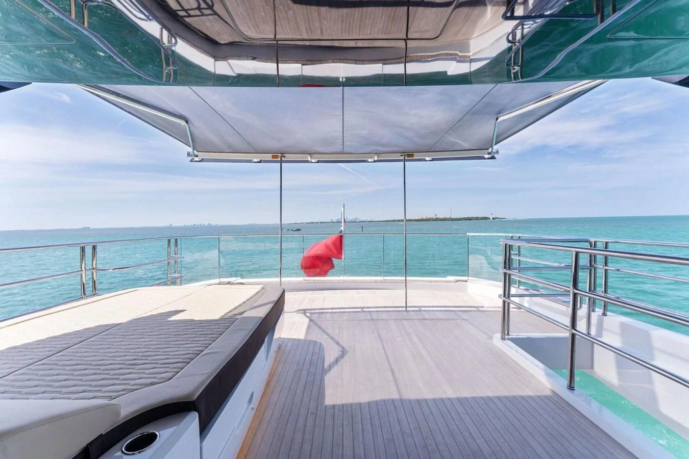 a person sitting on a deck on a boat aboard KNEAD IT Yacht for Sale