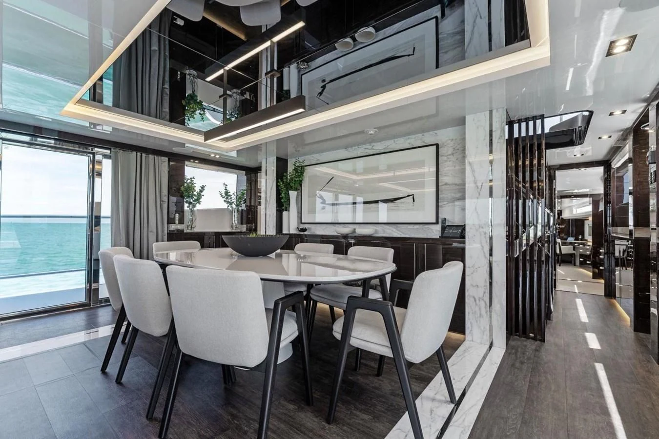 a room with a table and chairs aboard KNEAD IT Yacht for Sale