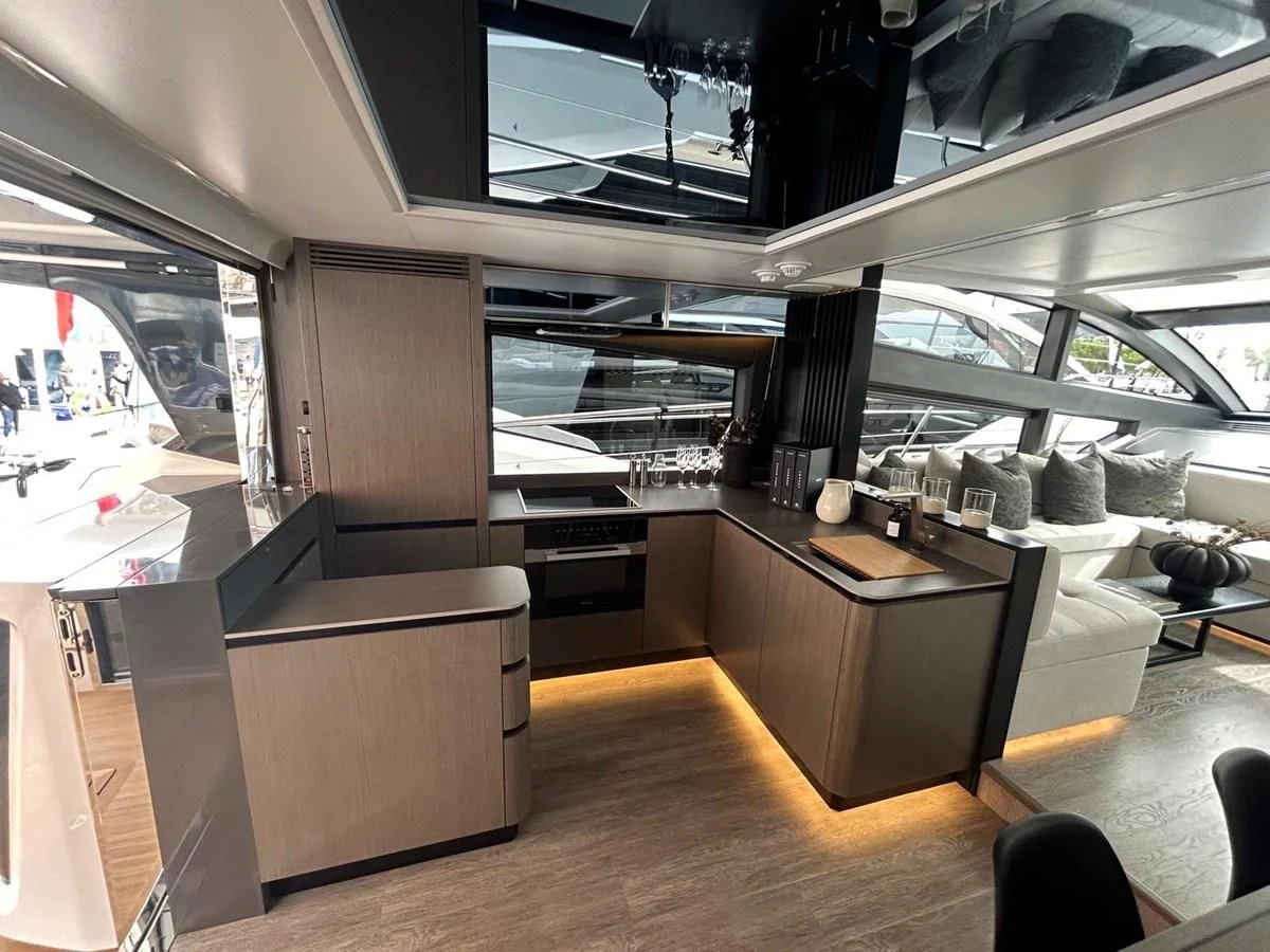 a room with a desk and chairs aboard KNEAD IT Yacht for Sale