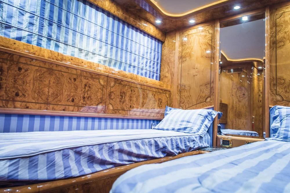 a room with two beds aboard HEMERA CUARTA Yacht for Sale