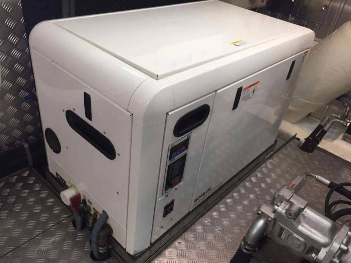 a white machine with black squares aboard HEMERA CUARTA Yacht for Sale