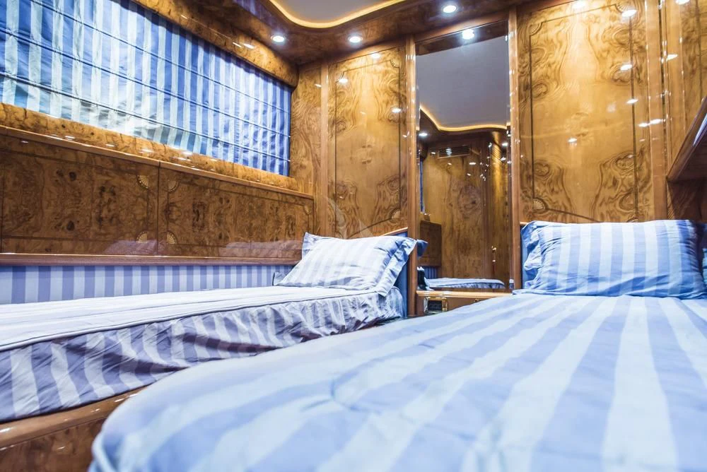 a couple of beds in a room aboard HEMERA CUARTA Yacht for Sale