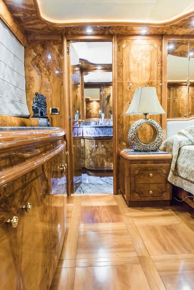 a room with a mirror and a dresser aboard HEMERA CUARTA Yacht for Sale