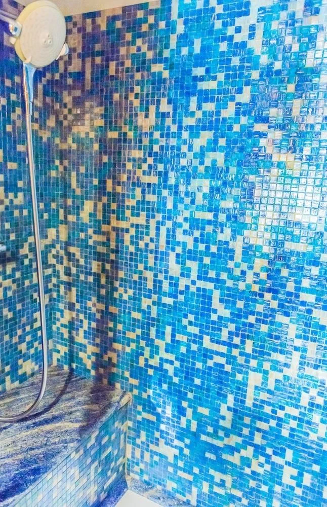 a blue and white checkered wall aboard HEMERA CUARTA Yacht for Sale