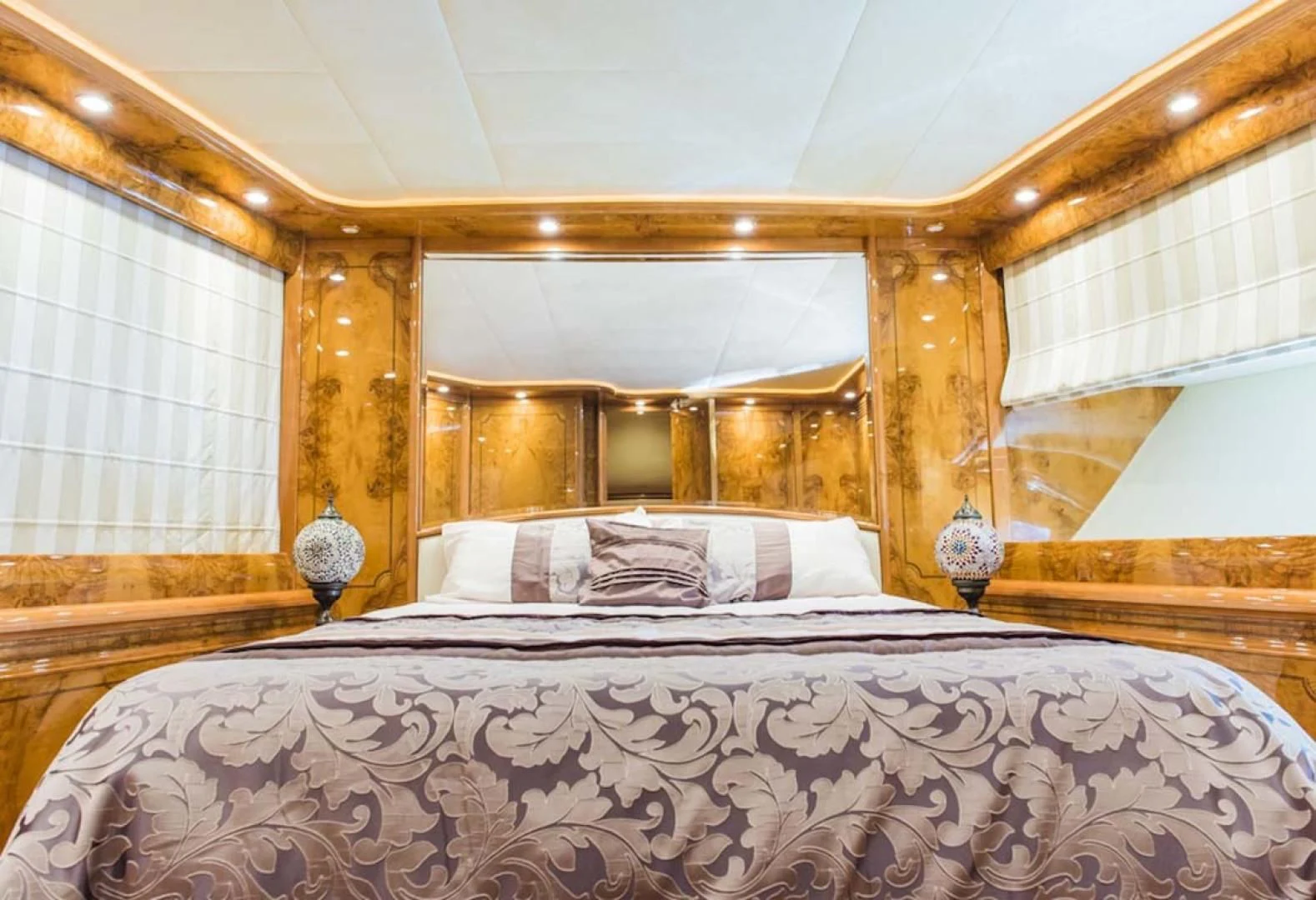 a bed with a large bed aboard HEMERA CUARTA Yacht for Sale