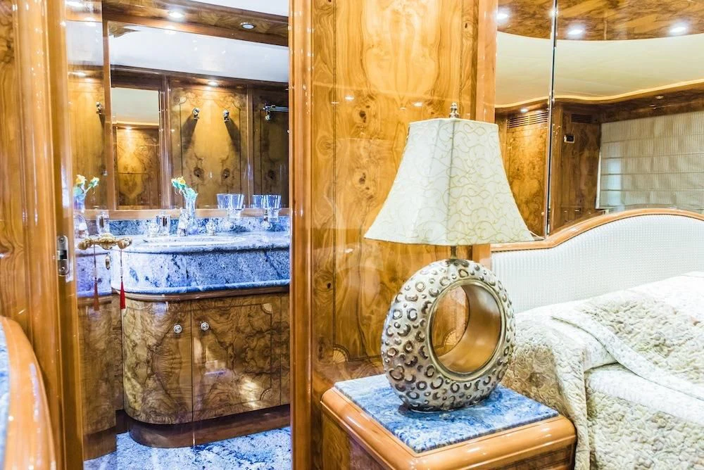 a clock on a stand aboard HEMERA CUARTA Yacht for Sale