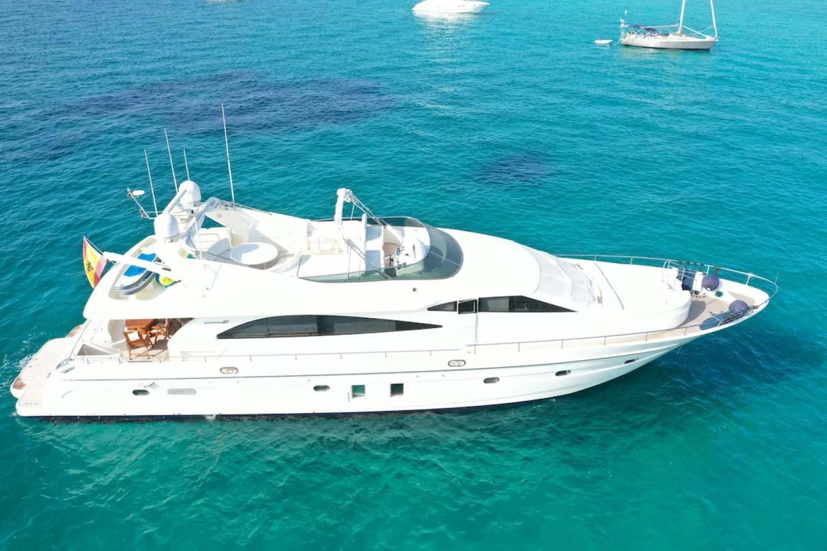 a white yacht in the water aboard HEMERA CUARTA Yacht for Sale