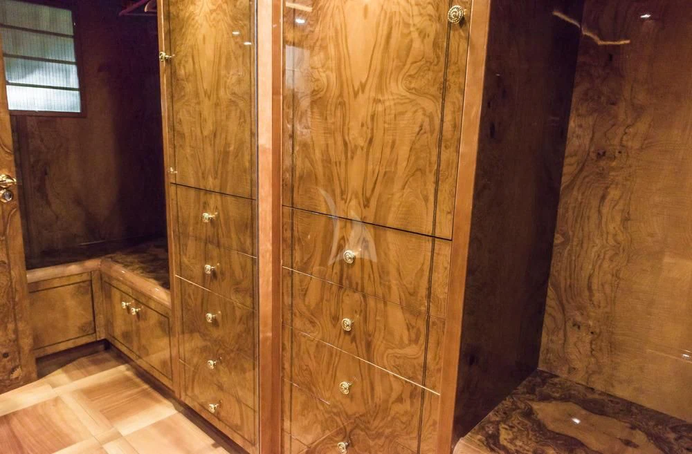 a wooden cabinet with drawers aboard HEMERA CUARTA Yacht for Sale
