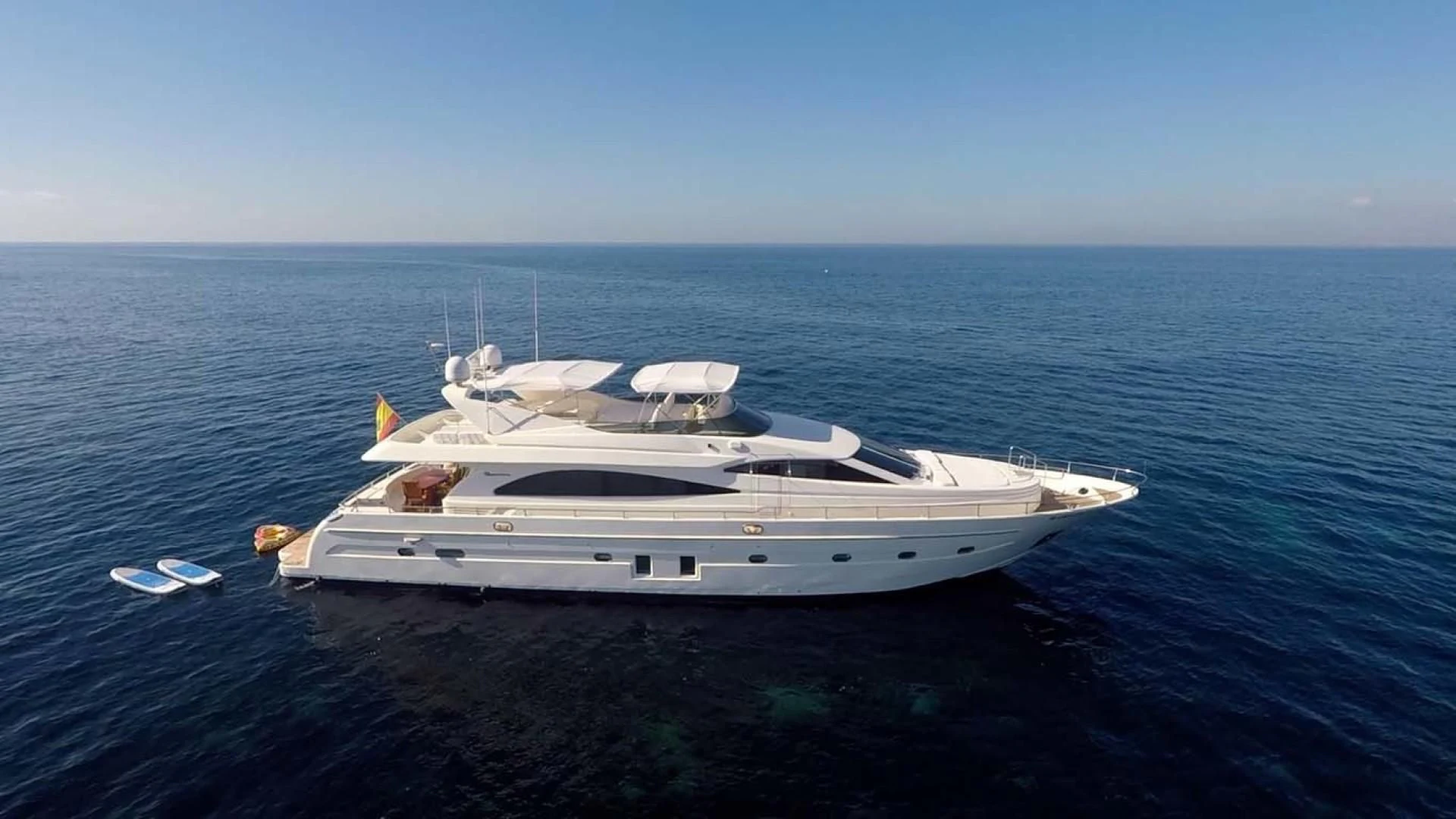 a white yacht in the water aboard HEMERA CUARTA Yacht for Sale