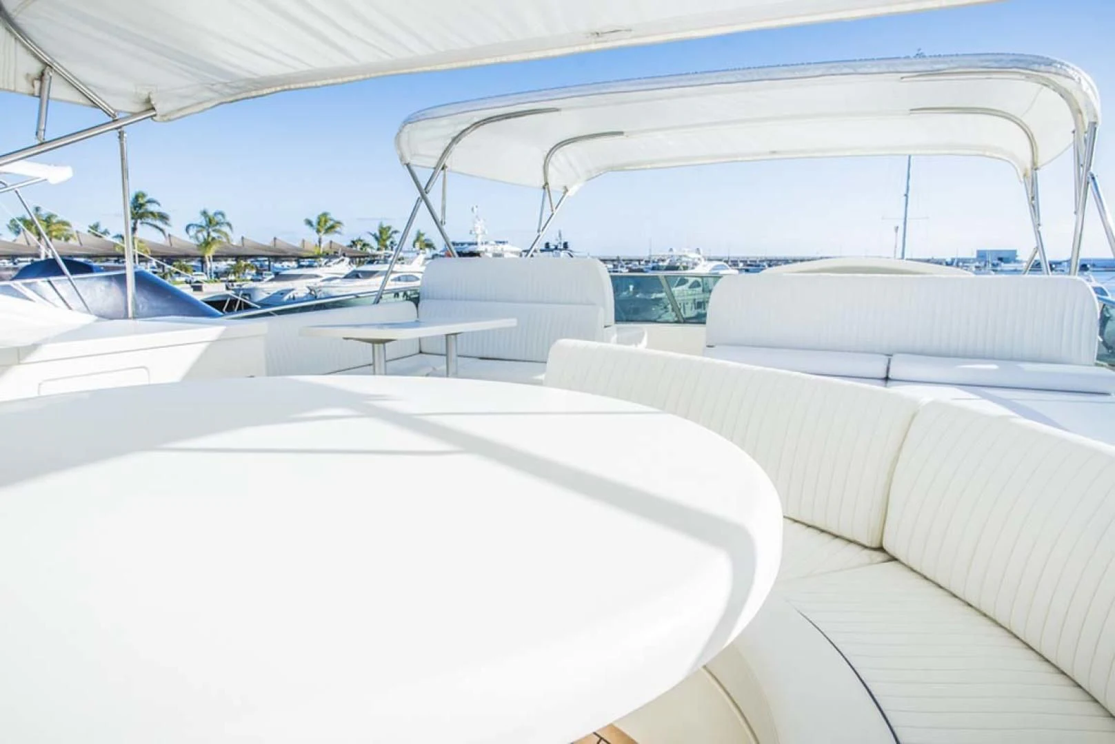 a large white lounge chair next to a pool aboard HEMERA CUARTA Yacht for Sale