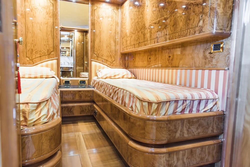 a bed in a room aboard HEMERA CUARTA Yacht for Sale