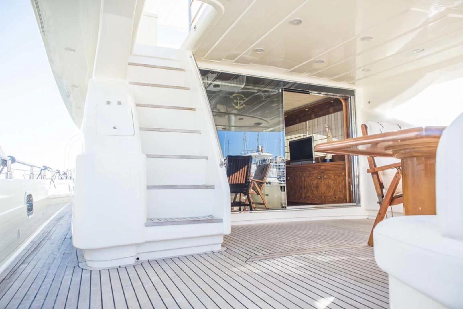 a staircase with a spiral staircase aboard HEMERA CUARTA Yacht for Sale