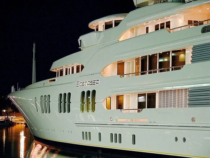 a large white building with a balcony aboard ECSTASEA Yacht for Sale