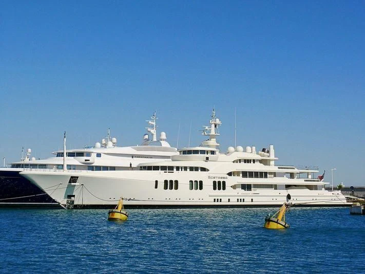 a large white boat in the water aboard ECSTASEA Yacht for Sale